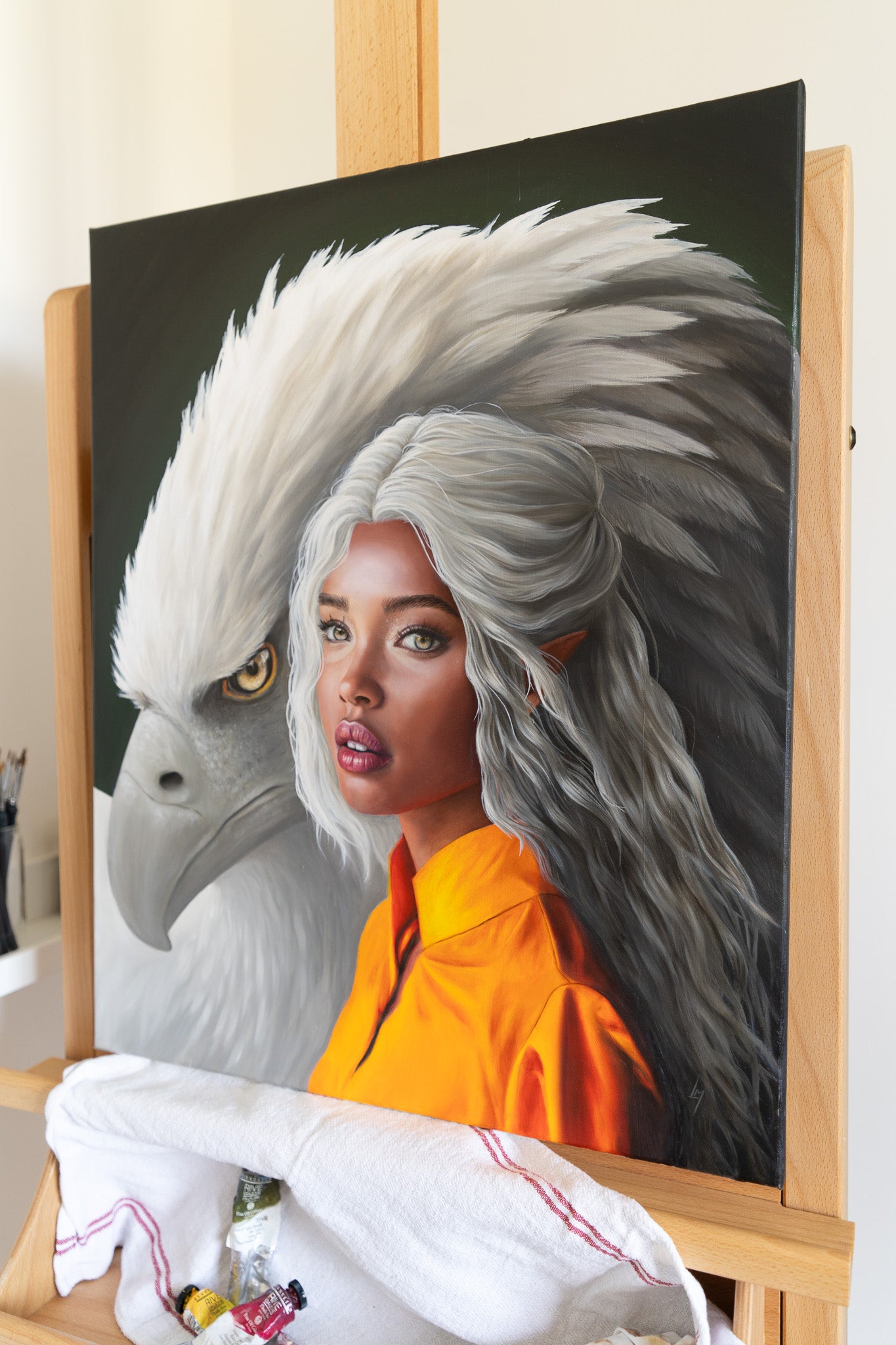 painting of an elf woman and an eagle 